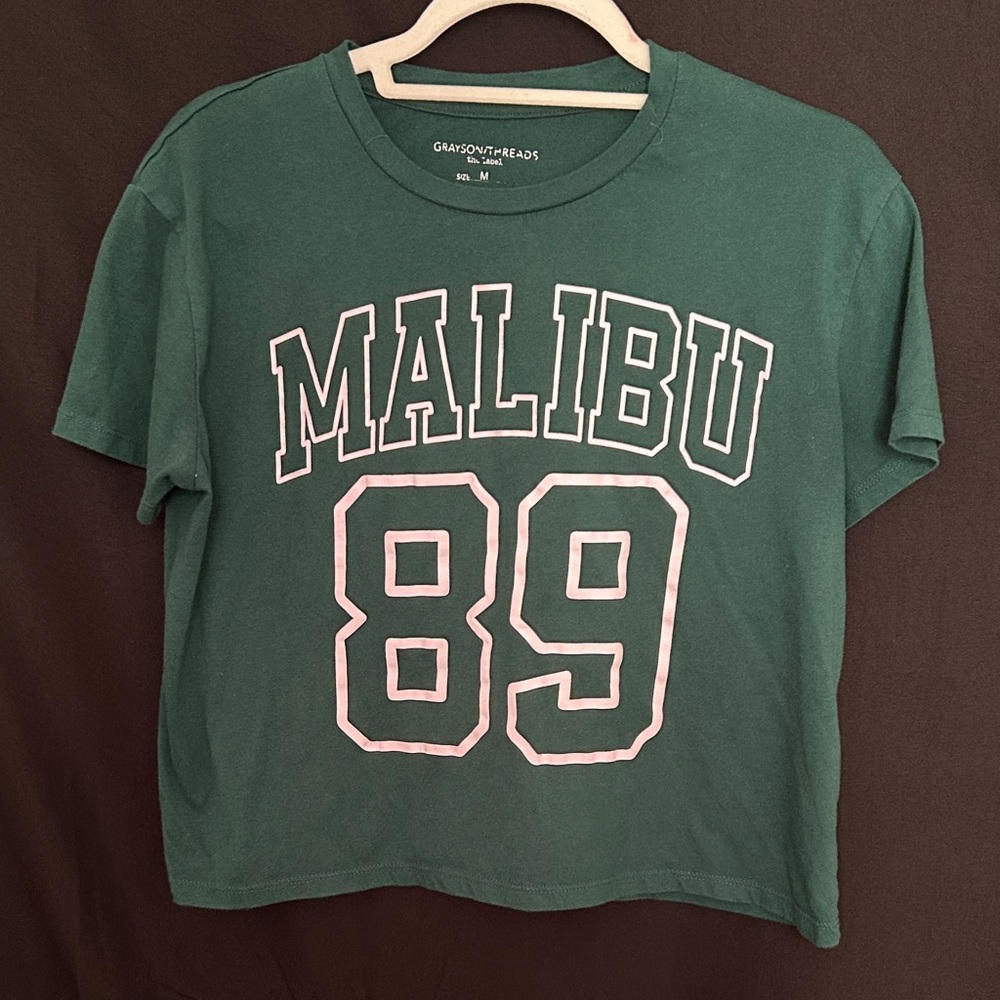 Grayson Threads Green Graphic Tee with White/Pink Lettering